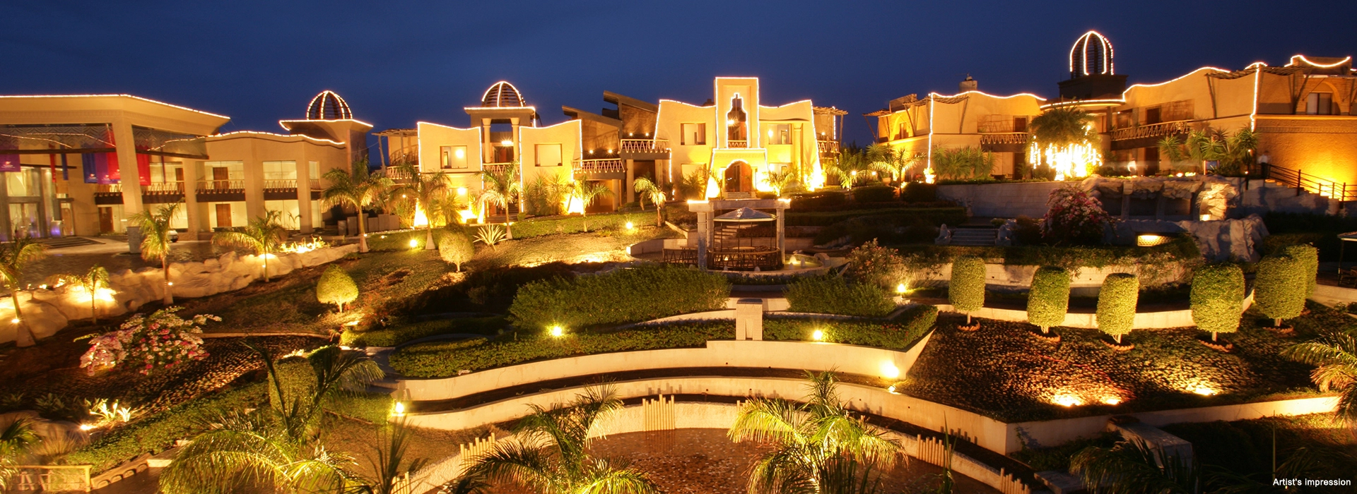 Night view of Nyati Groups resort with illuminated lights, showcasing a landmark project in the hospitality sector
